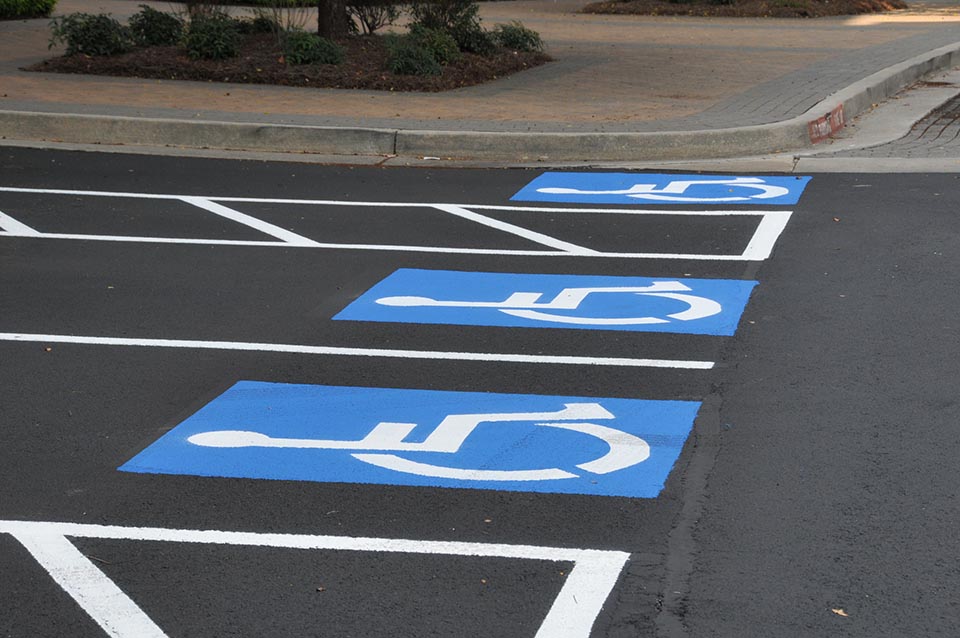 CFresh blue handicap stripes on commercial parking lot