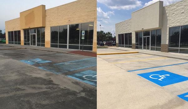 Line striping — fresh blue handicap stripes on commercial lot